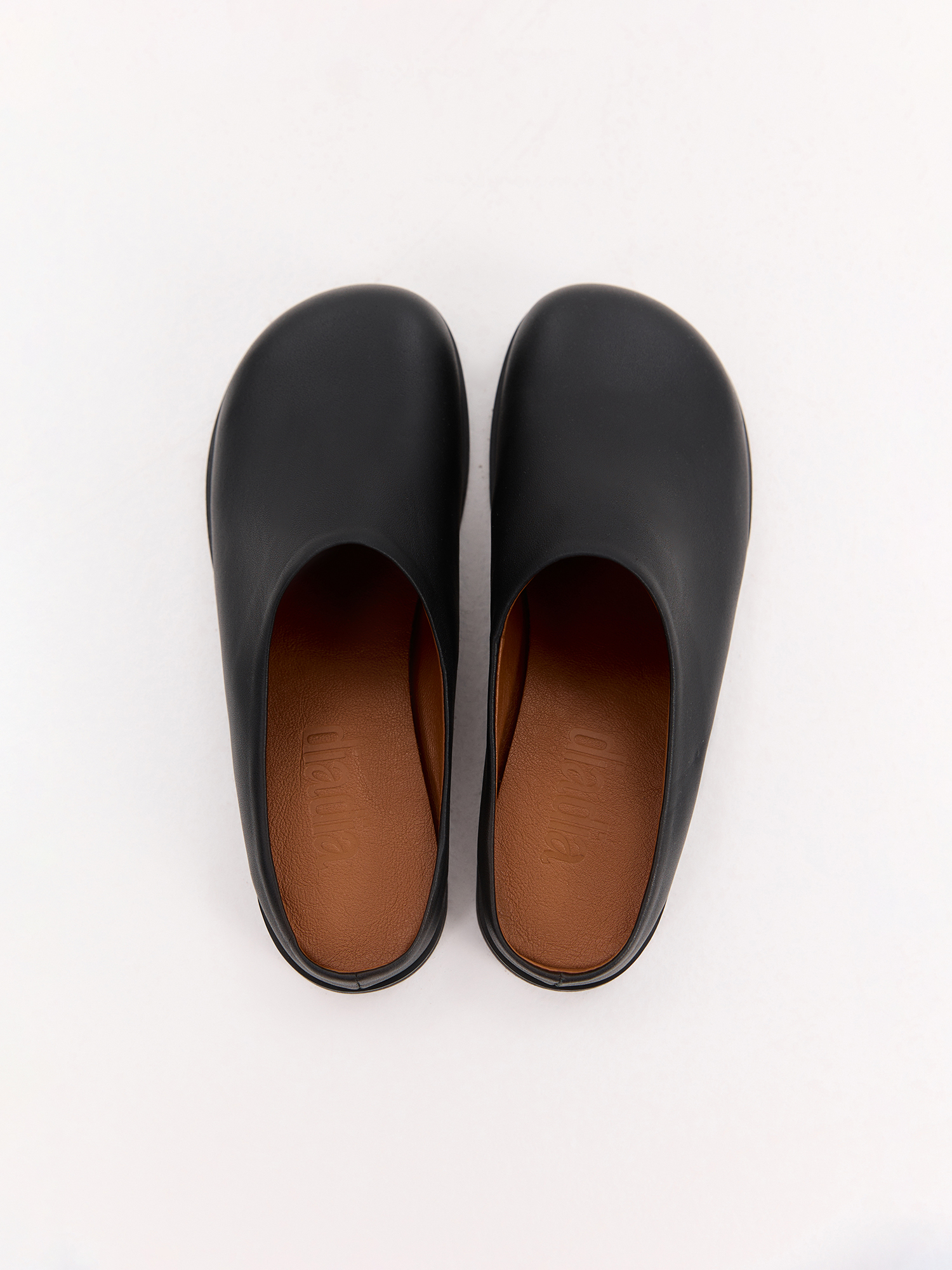 Black leather mules