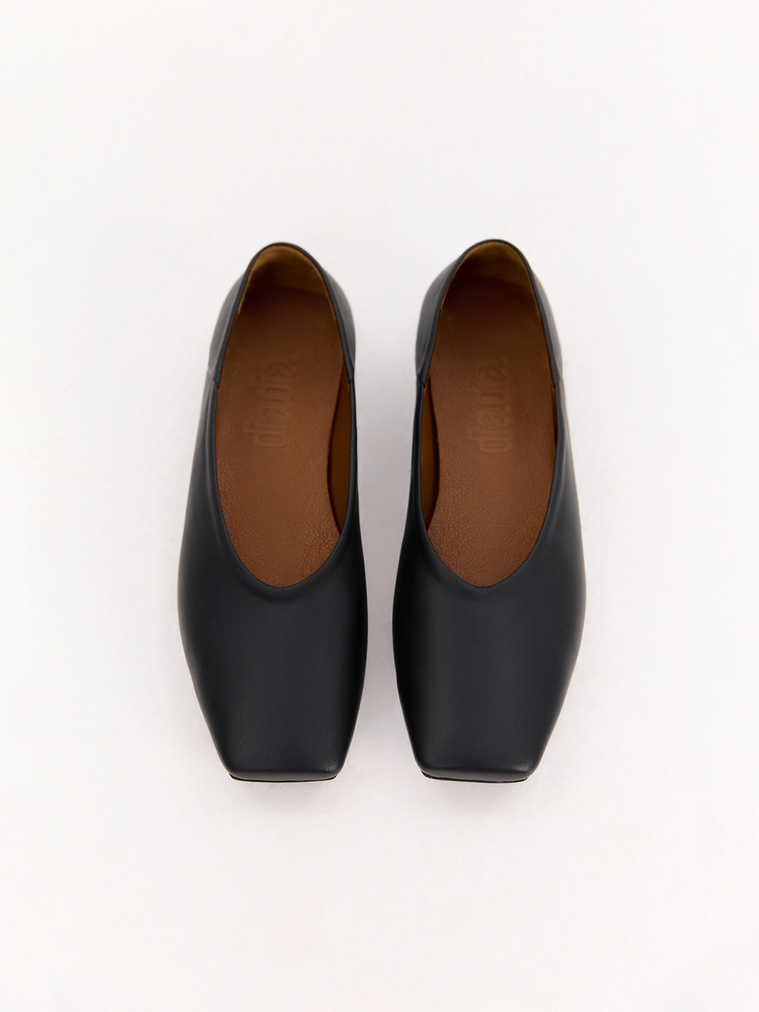 Black leather ballet flats