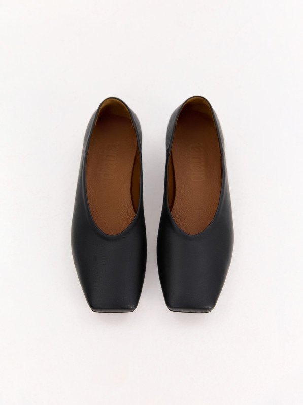 Black leather ballet flats