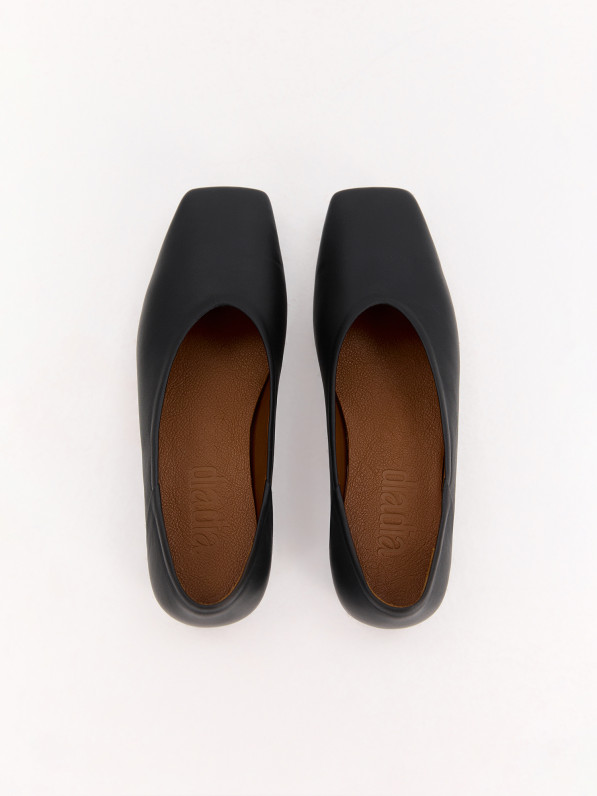 Black leather ballet flats