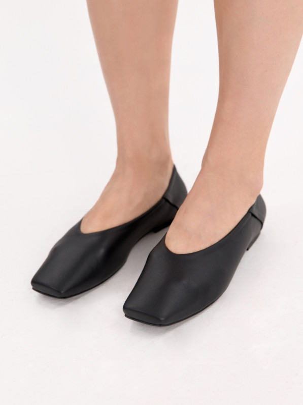 Black leather ballet flats
