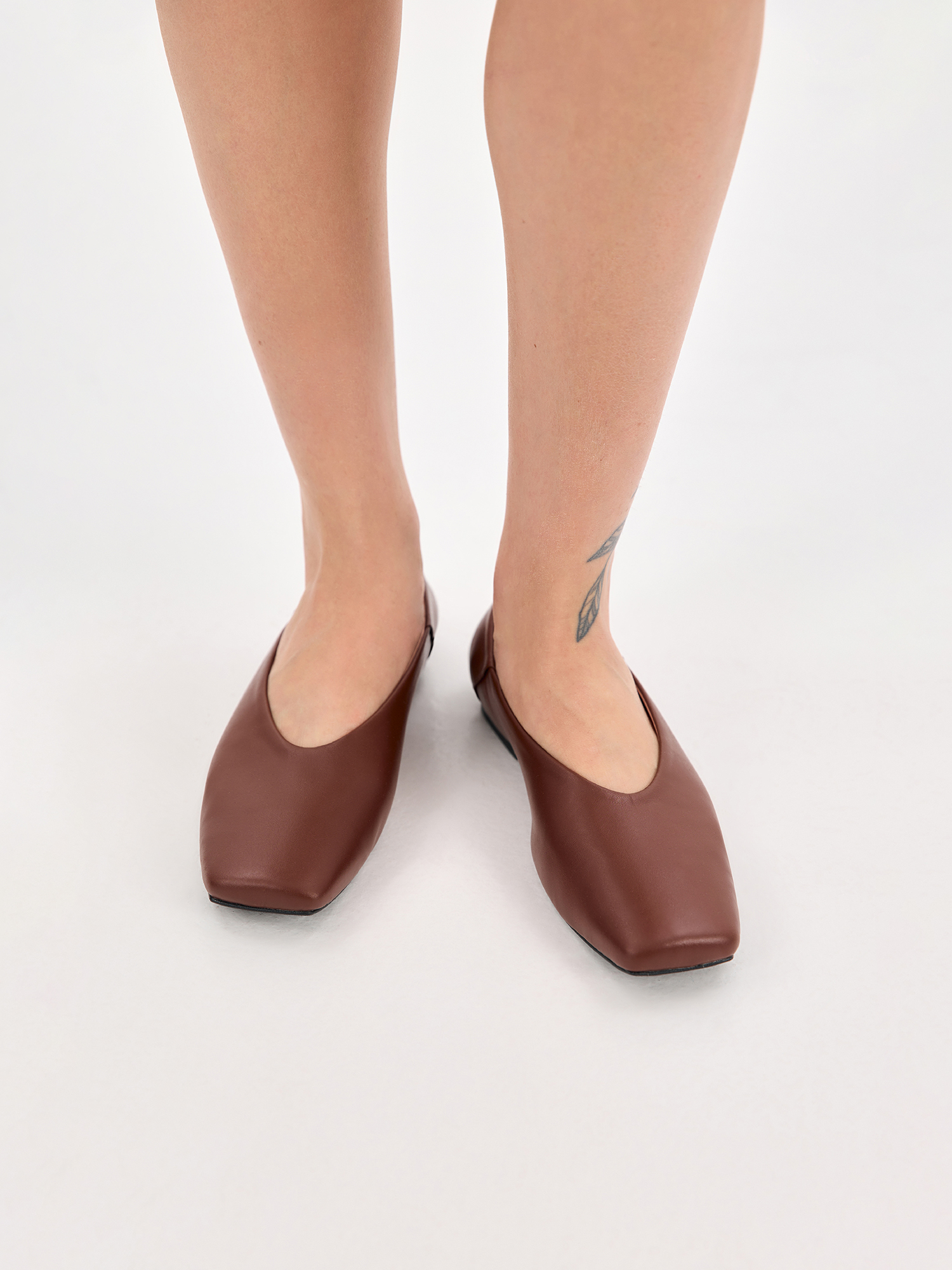 Brown ballet flats made of genuine leather