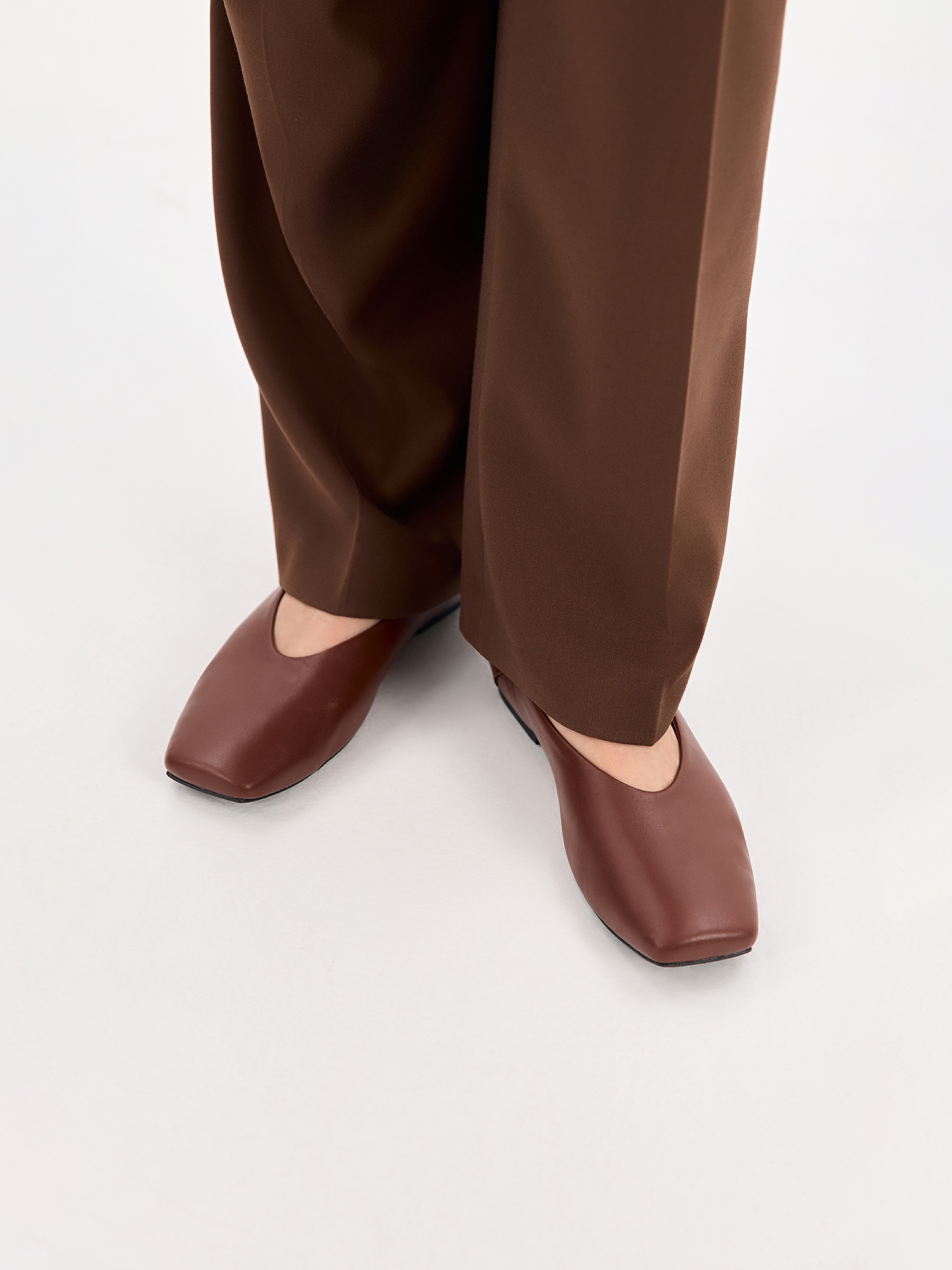 Brown ballet flats made of genuine leather