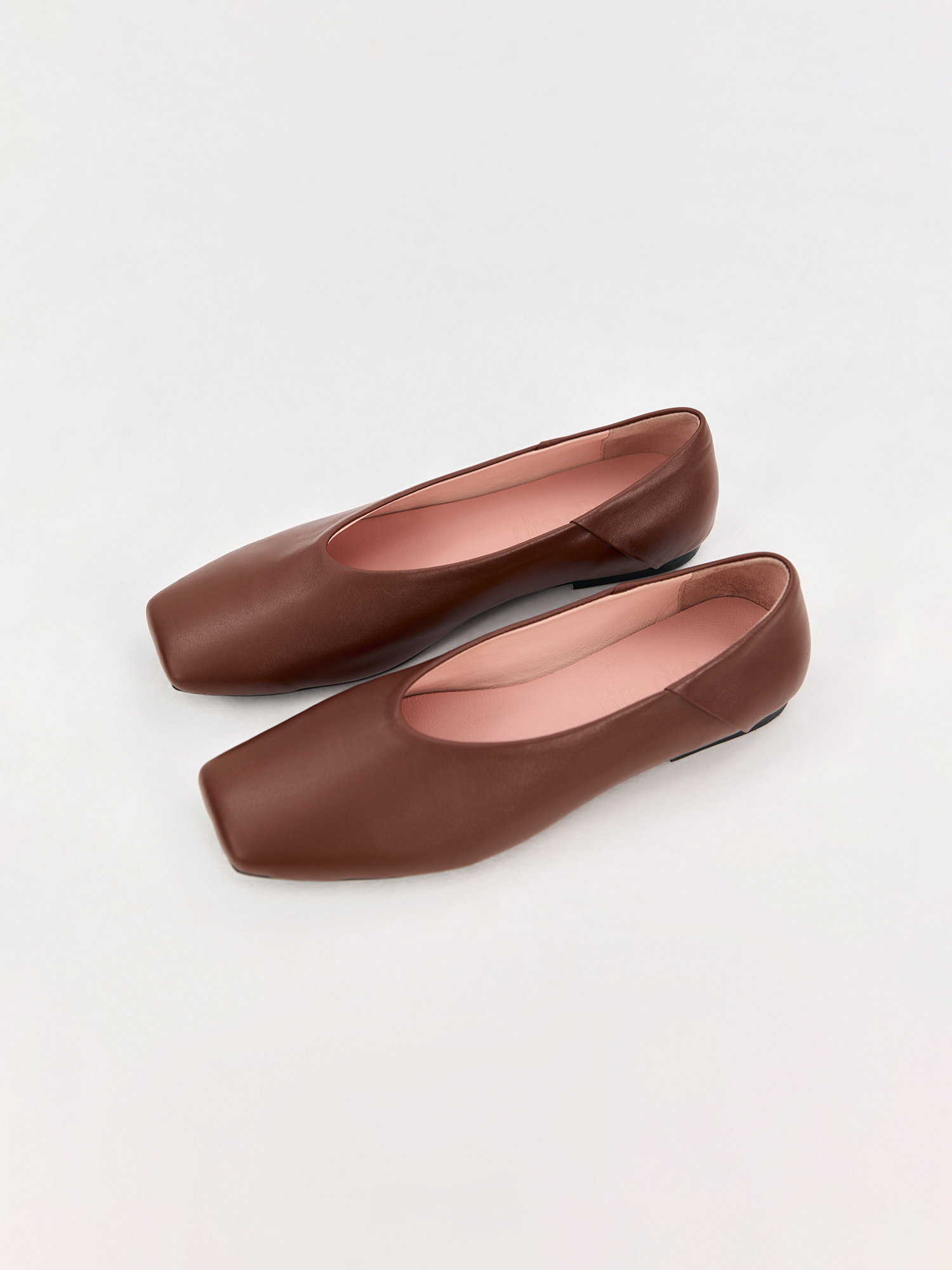 Brown ballet flats made of genuine leather