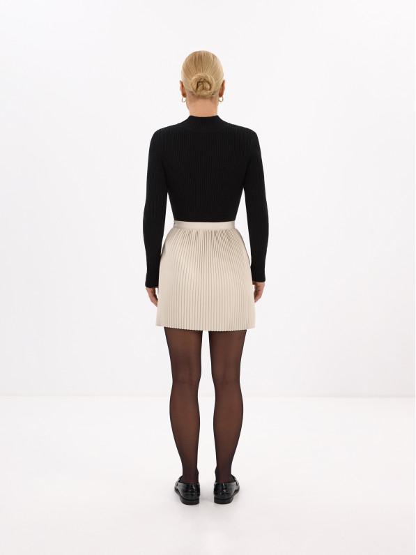 Khaki skirt is made of eco-leather