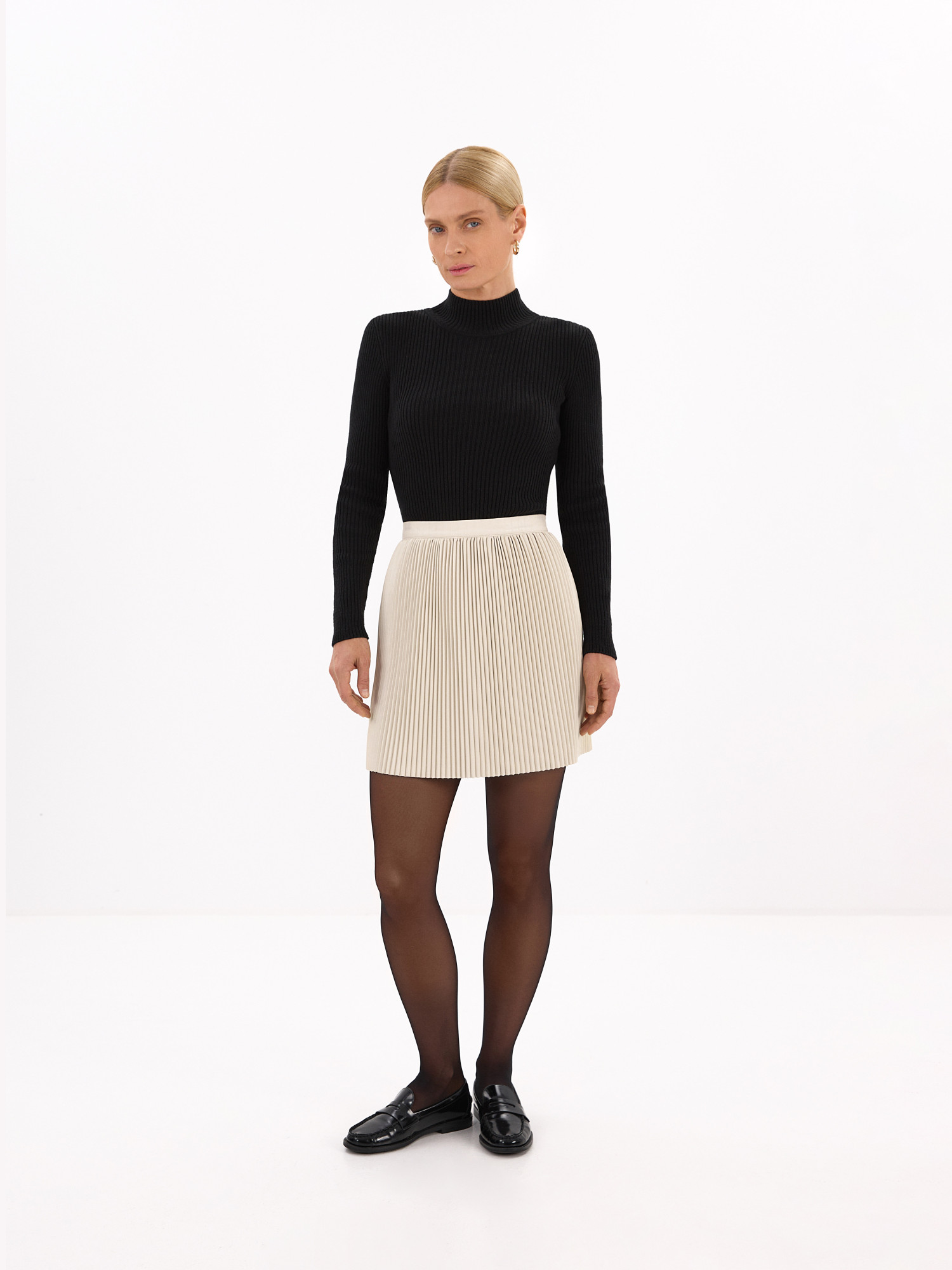 Khaki skirt is made of eco-leather