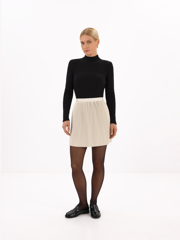 Khaki skirt is made of eco-leather