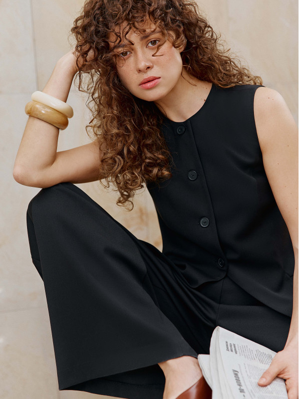 Black asymmetric elongated vest