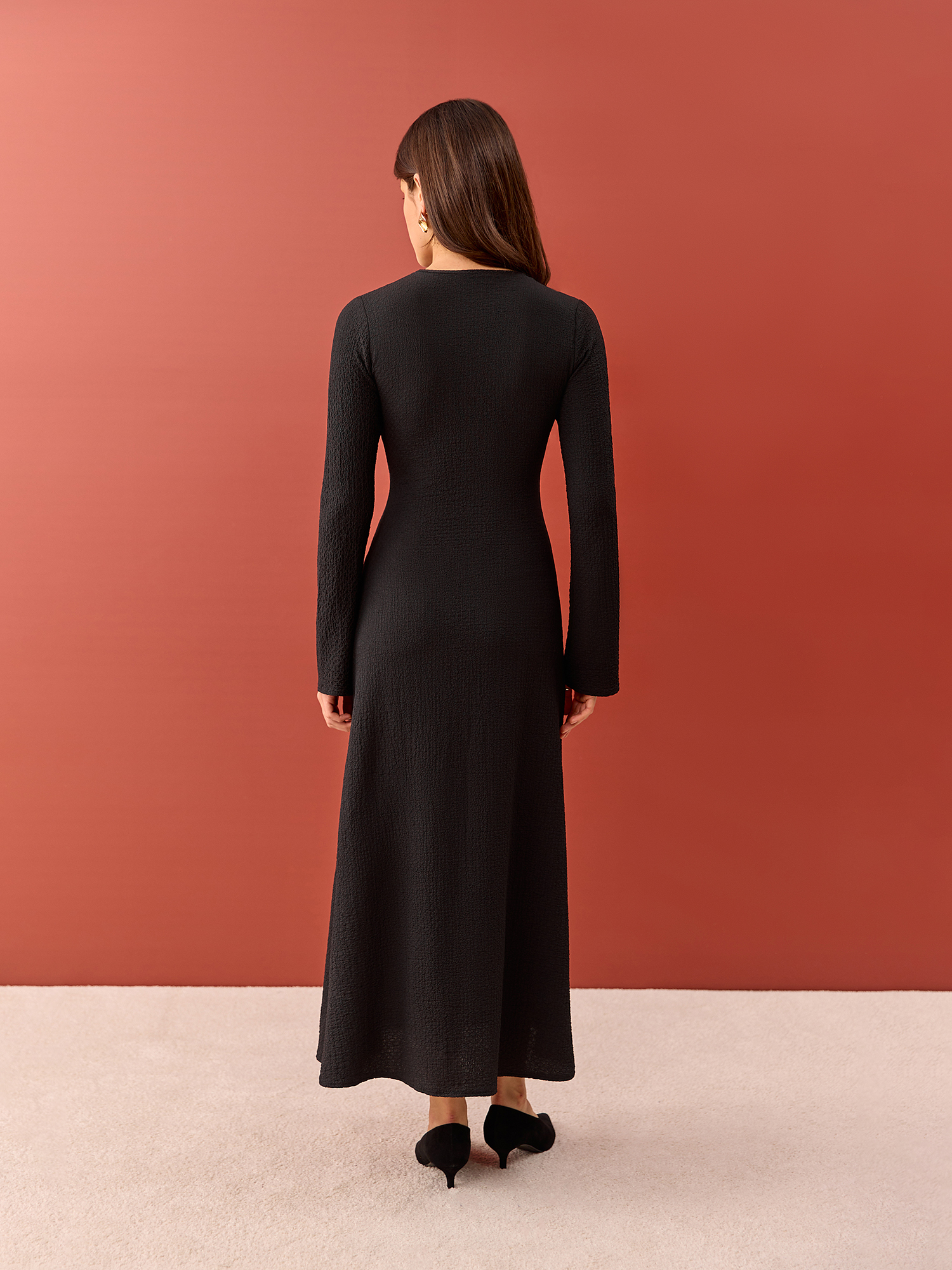 Maxi dress made of gathered fabric, black