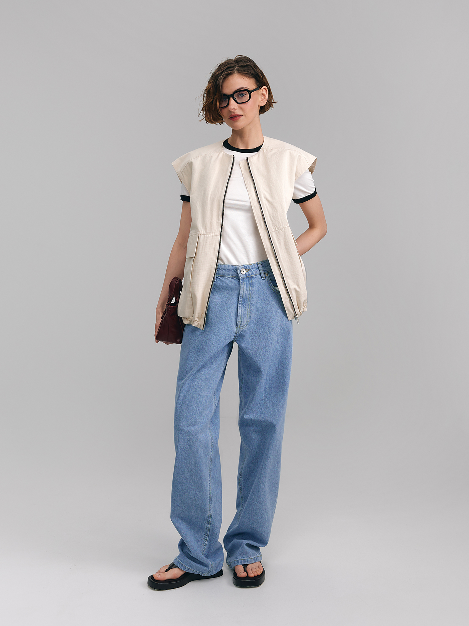 Sleeveless top with voluminous pockets, light beige